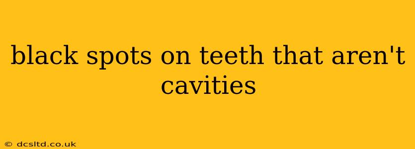 black spots on teeth that aren't cavities