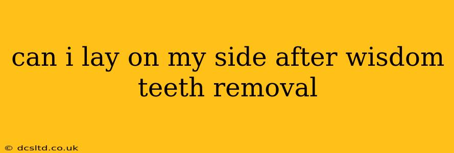 can i lay on my side after wisdom teeth removal