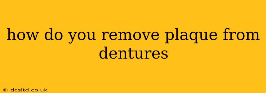 how do you remove plaque from dentures