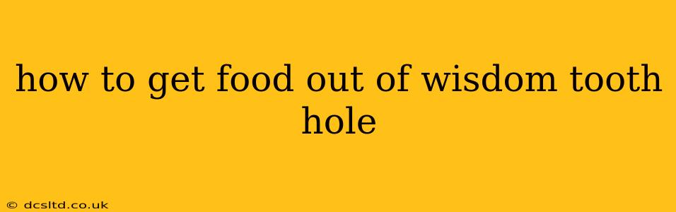 how to get food out of wisdom tooth hole