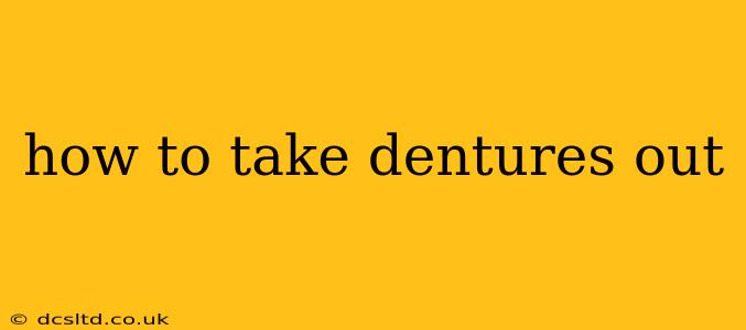 how to take dentures out