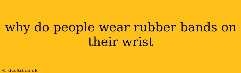 why do people wear rubber bands on their wrist